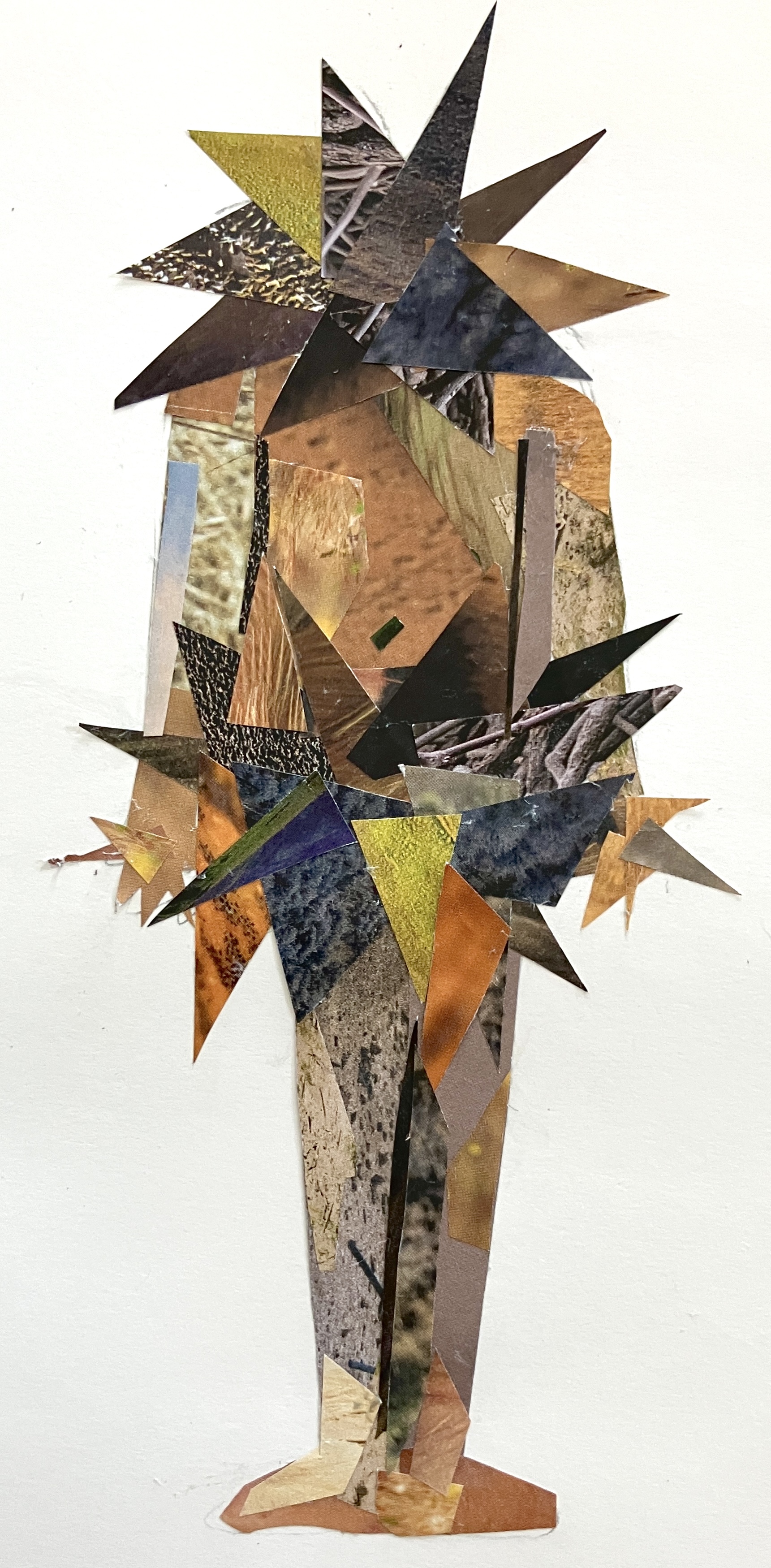 tor made of collaged magazines
