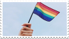 hand waving pride flag